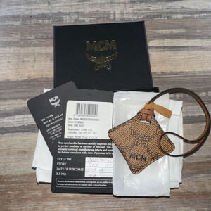 Authentic MCM Travel AirTag Holder Leather Case New With Box, Dust Bag, And COA